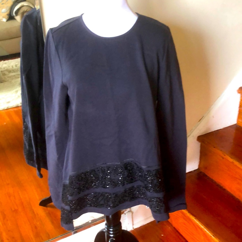 Schumacher sequin bottom hem top
